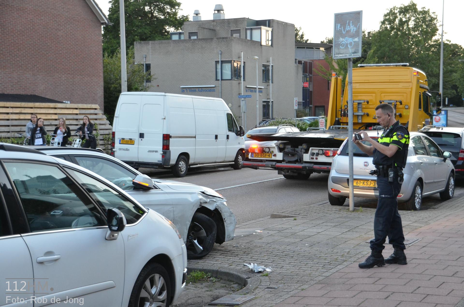 Ongeval met geparkeerde auto's Beethovenlaan WDN 09